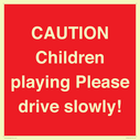 caution-children-playing-please-drive-slowly~